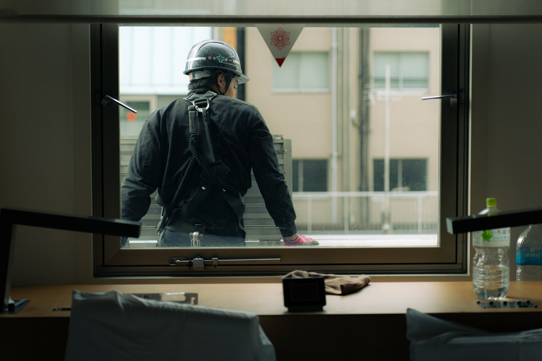 A window repair man in Tokyo, Japan.